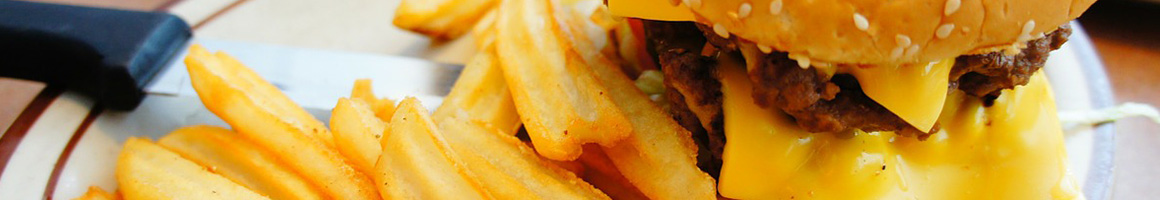 Eating Burger at Country Burger Murphy restaurant in Murphy, TX.